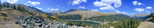 Pristine lake in the middle of the rocky mountains - 3 monitor wallpaper - 5760x1080