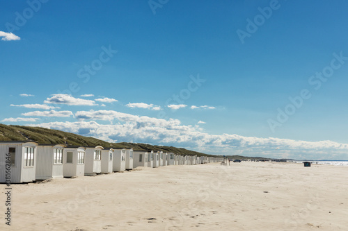 Beach of Løkken , North Jutland, Denmark with it's endless rows of wooden white beach huts