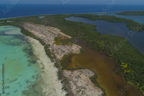 Landscape shore coast Caribbean Island. Various shades of blue. Bay from drone aerial view in Los Roques, National Park