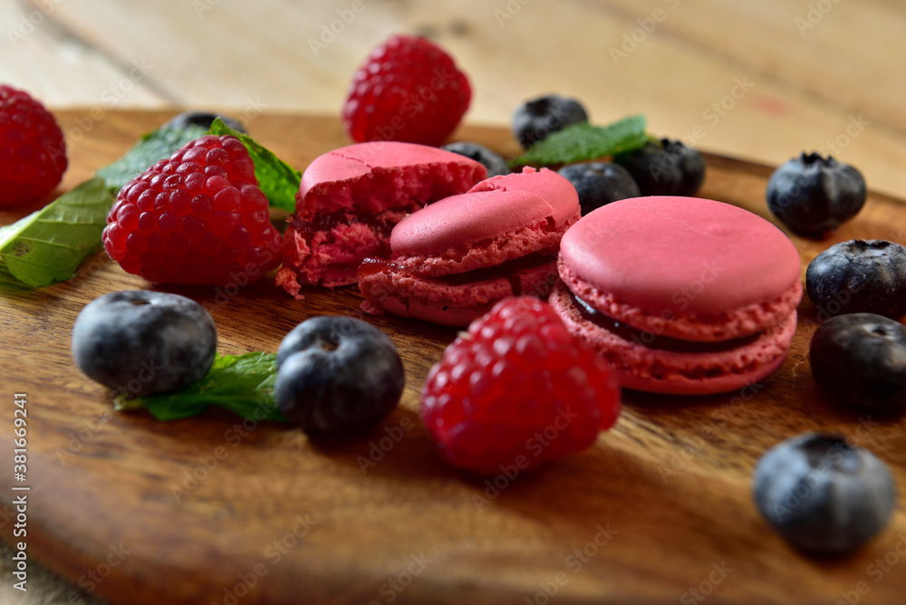 Homemade macaron on a wooden table Homemade macaron on a wooden table