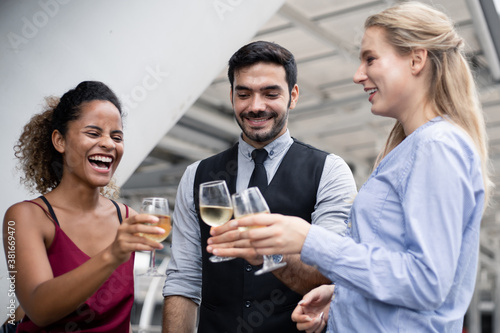 Group of business people celebrate by drinking wine. © P Stock