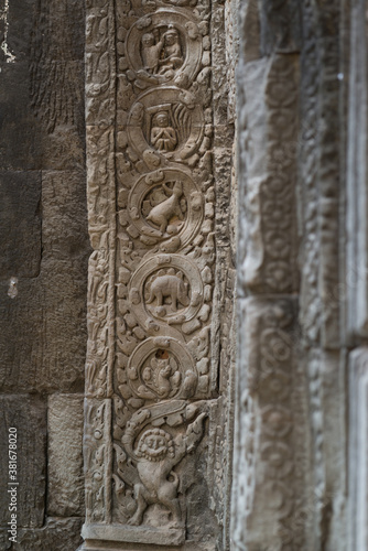 Various sculptures on the wall of Ta Prohm temple, Siem Reap, Cambodia.