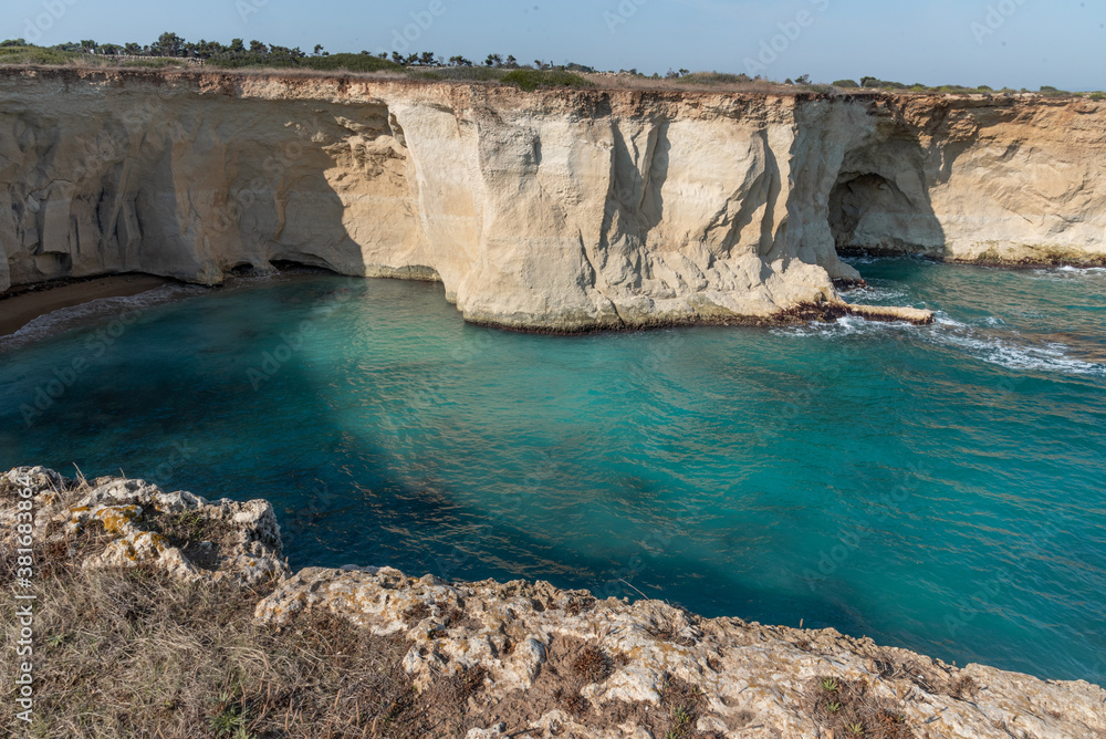 View of the coastline at the Plemmirio, a natural marine reserve near Syracuse, in the southern Sicily, Italy. The shot is taken in a sunny day
