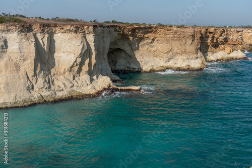 View of the coastline at the Plemmirio, a natural marine reserve near Syracuse, in the southern Sicily, Italy. The shot is taken in a sunny day