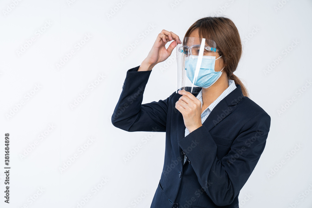 Businesswoman with face mask and Face shield Woman wearing protective mask. Corona virus protection. Businesswoman with face mask and Face shield Woman wearing protective mask. Corona virus protection.