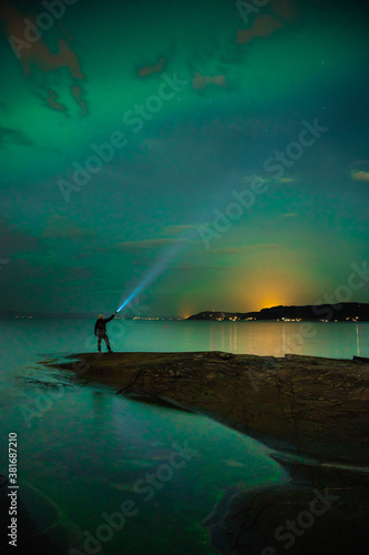 Northern lights over flatholmen  Stjordal  Norway. Aurora Borealis