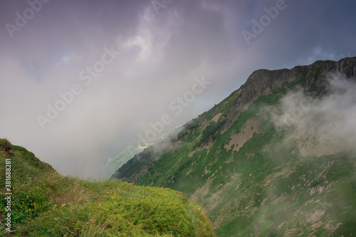 Cloudy slopes and mountain peaks, beautiful landscape