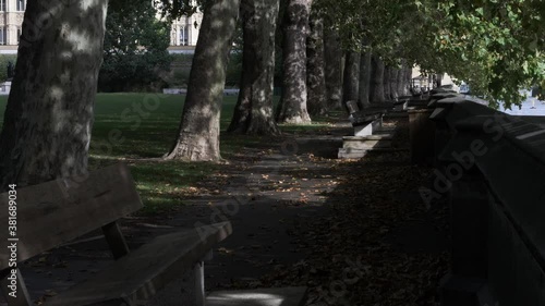 Benches on the Thames in Victoria Tower Gardens Park in London. Locked Off photo