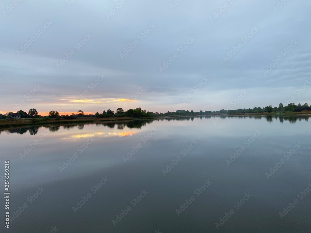 Fototapeta premium sunset over the lake