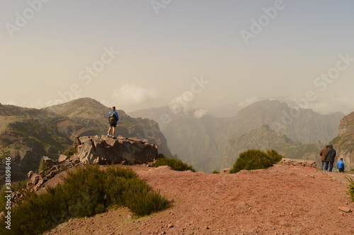 Hiking on the mountain ridge of Madeira Island on the way to Pico Ruivo, Portugal