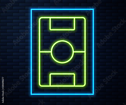 Glowing neon line Football table icon isolated on brick wall background. Hockey table. Vector.