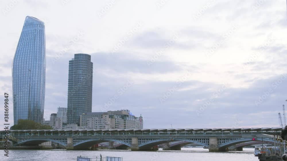 Tall buildings in central London by the Thames late afternoon Tall buildings in central London by the Thames late afternoon