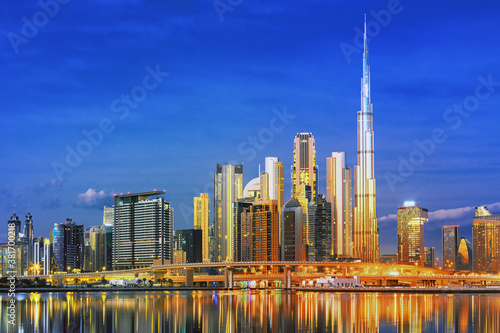 Dubai skyline with reflection in the river at sunrise   Dubai  United Arab Emirates 