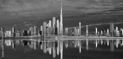 View on Dubai skyline with reflection at the sunrise, Dubai, United Arab Emirates 