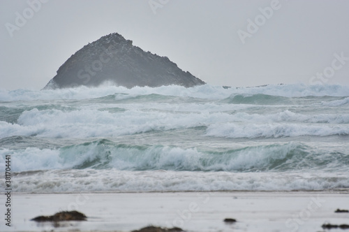 Rough sea in Brittany, France. Rocky island in the atlantic ocean.