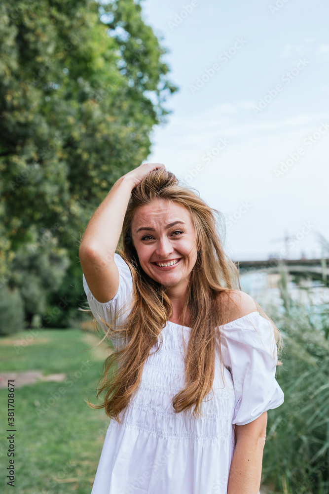 Caucasian white woman smiling at camera