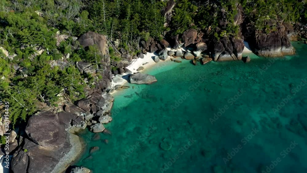 Wide epic drone shot of beach and rocks at Hook Island near Whitsunday Australia Wide epic drone shot of beach and rocks at Hook Island near Whitsunday Australia