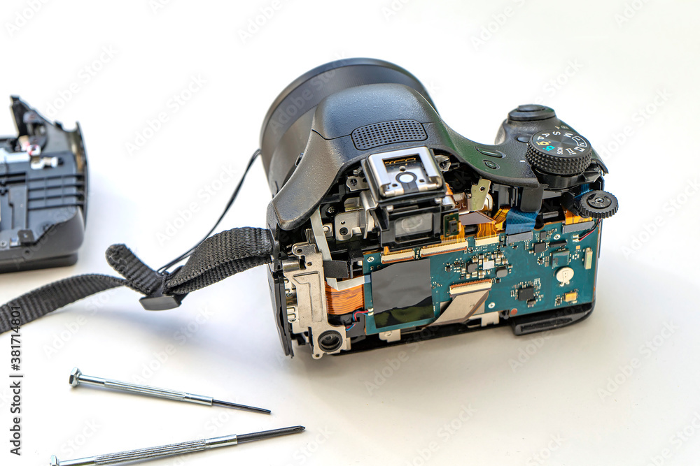 repair of digital camera. The camera is disassembled. repair of digital camera. The camera is disassembled.