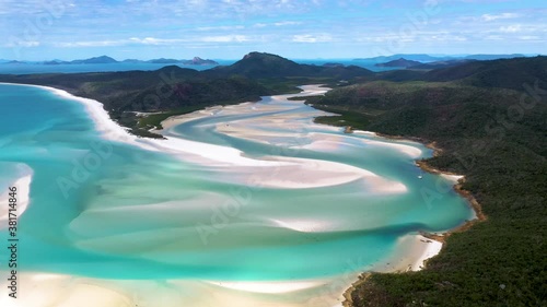 Rotating cinematic drone shot of Whitehaven Beach Whitsunday Island Australia