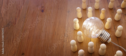 Photography business concept image of people figures over wooden table, human resources and
