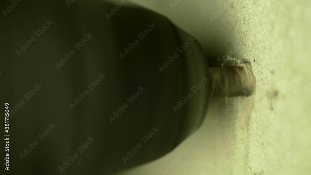drilling of a concrete wall close up