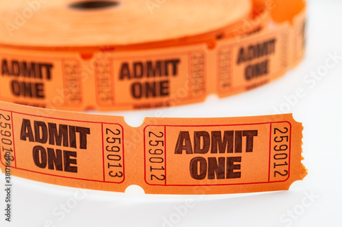 Obraz na płótnie Carnival draw winner, admit one ticket and movie theater admission concept with close up on orange color roll of raffle tickets w salonie