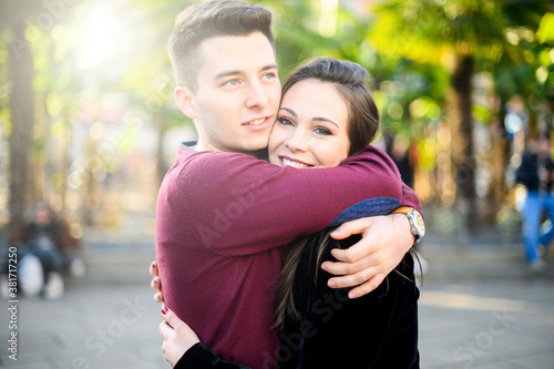 Young couple hugging outdoor with love