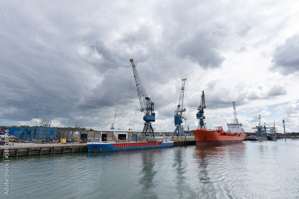 Harbor with large cranes and containers in Rotterdam, Holland