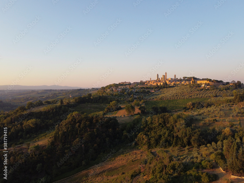 Amazing sunset panoramic view of towers of old town San Giminiano, Tuscany, Italy