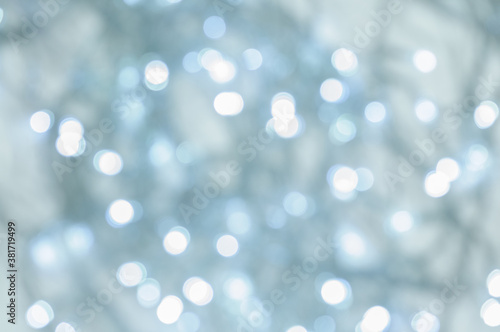 Soft defocused shiny white-blue bokeh abstract background