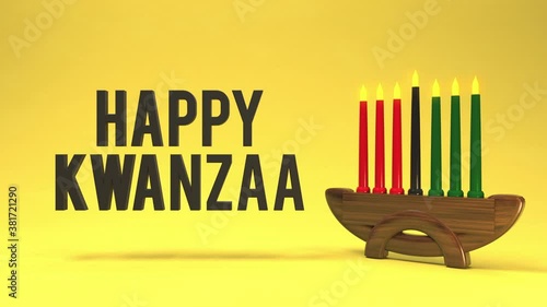 Happy Kwanzaa holiday greeting. 3D Animated letters popping on to screen with candles on candelabra.  photo