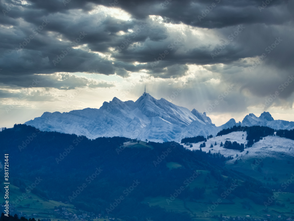 Distant view of the snow covered Santis peak, the highest mountain in the Alpstein massif of northeastern Switzerland