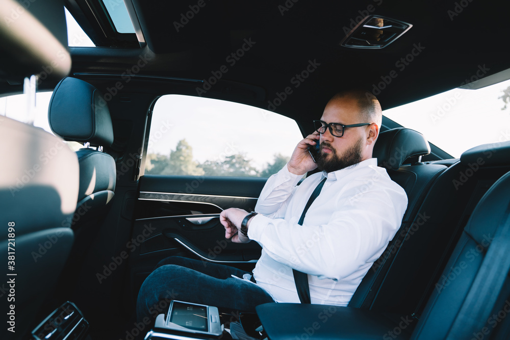 Pensive man talking on smartphone Pensive man talking on smartphone