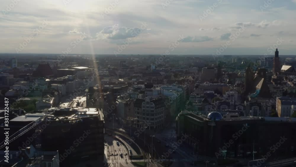 Aerial shot of the city center of Wroclaw, Poland. Camera flies back to reveal a busy road junction with trams and cars. Aerial shot of the city center of Wroclaw, Poland. Camera flies back to reveal a busy road junction with trams and cars.