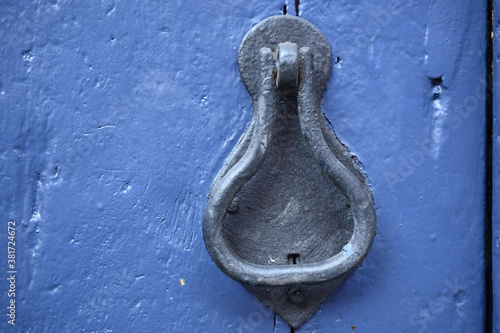 blue knocker in the old door
