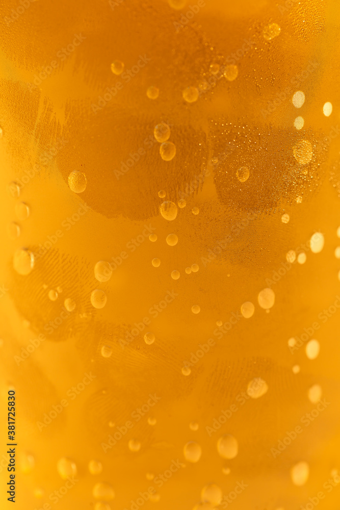 Bubbles on the wall of a glass from a carbonated drink Bubbles on the wall of a glass from a carbonated drink
