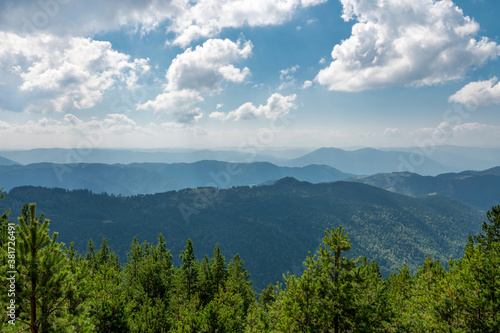 Beautiful summer landscape in mountains with cloudy sky. Zlatibor Serbia