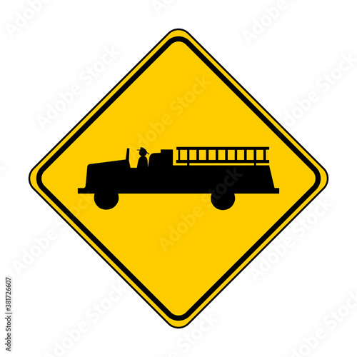 Fire station road sign. Vector illustration of yellow diamond shaped warning traffic sign with fire engine icon inside. Caution fire truck isolated on white background. Emergency symbol.