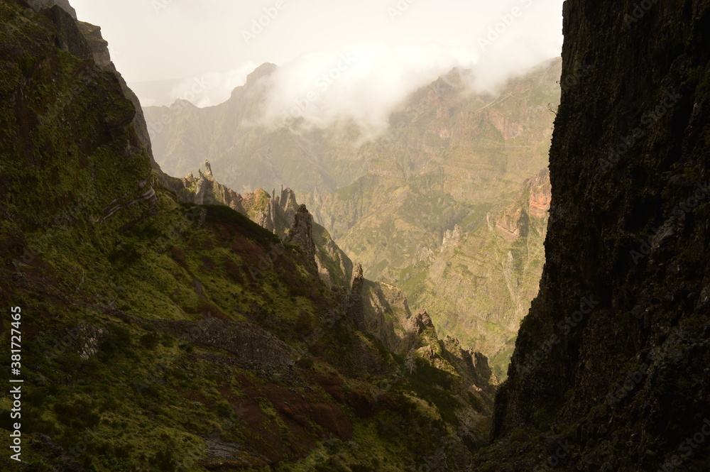 The misty and dramatic mountain landscape on Madeira Island in Portugal The misty and dramatic mountain landscape on Madeira Island in Portugal