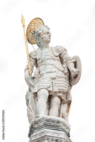 Portrait of Roman warrior old sculpture as a saint at the dome roof of Basilica San Marco in Venice, Italy, isolated at white background.