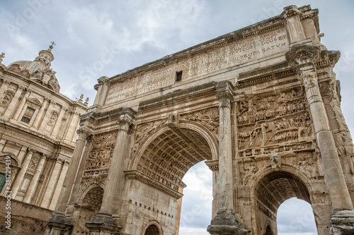 The Arch of Septimius Severus is a white marble triumphal arch. Detail from the Arch of Septimius Severus at the Forum Romanum, Rome, Italy
