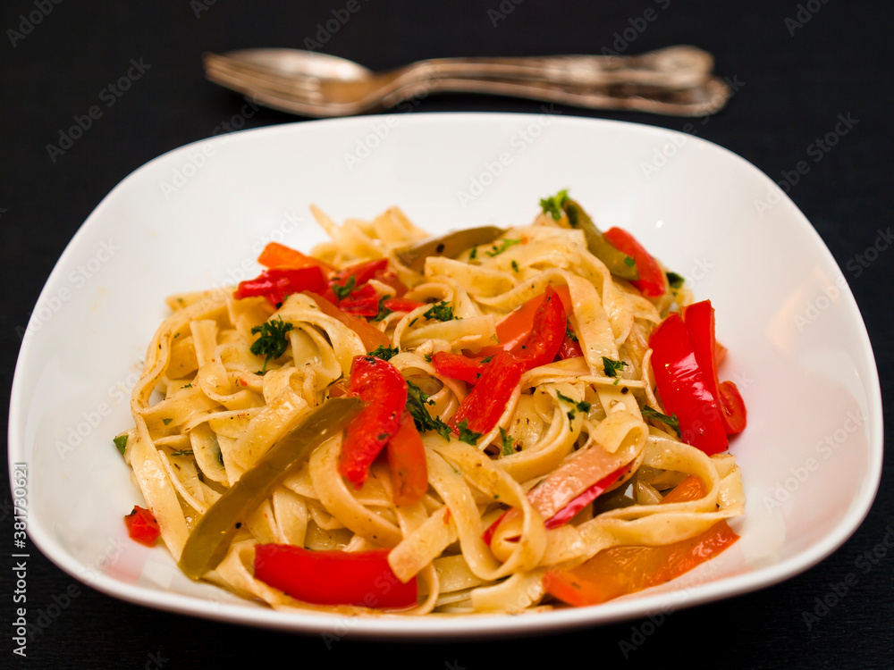 Tagliatelle with peppers and parsley