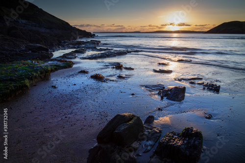 Low water at sunset on Manorbier beach in West Wales, UK
