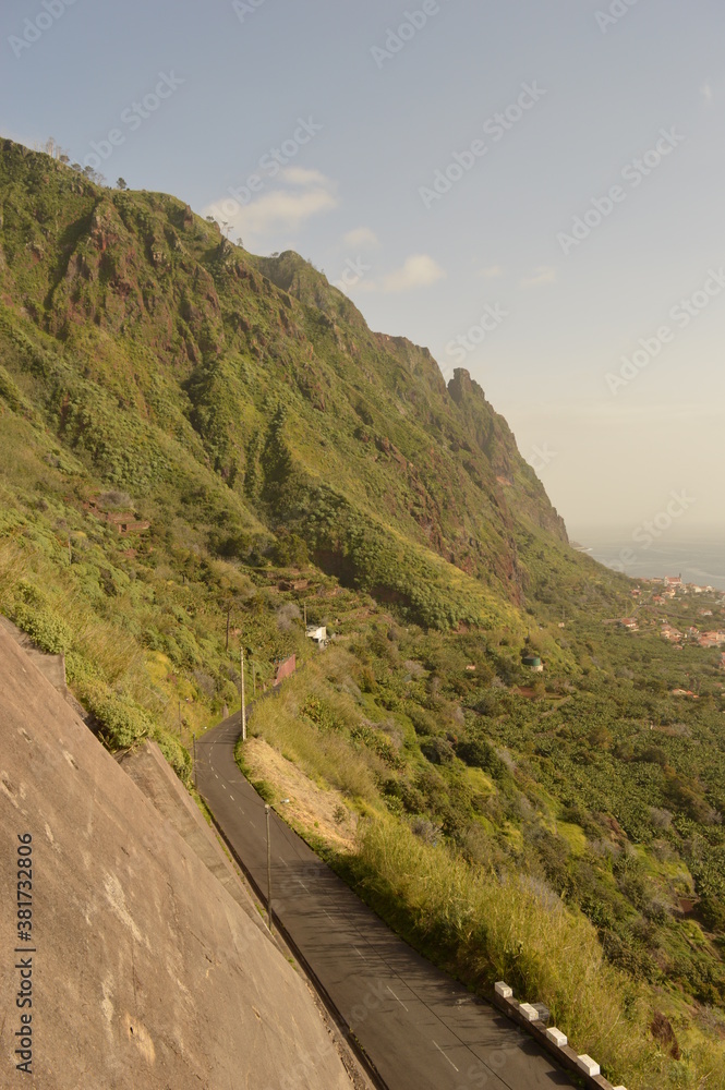 Fototapeta premium Hiking along the coast, by the waterfalls and in the green levadas of Madeira Island in Portugal