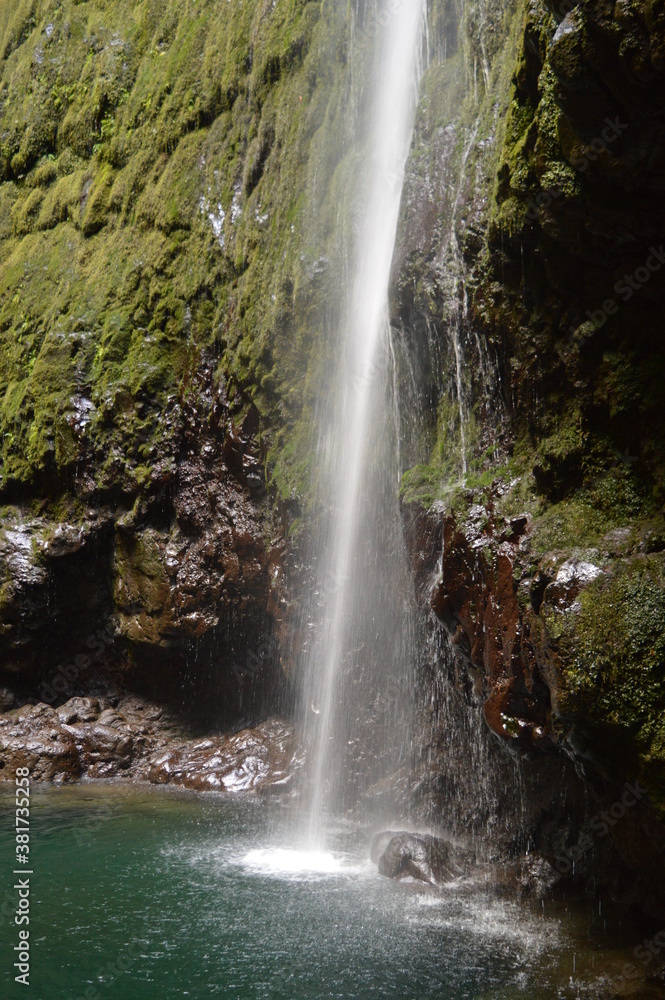 Obraz premium Hiking along the coast, in the mountains and along the levadas of Madeira Island in Portugal