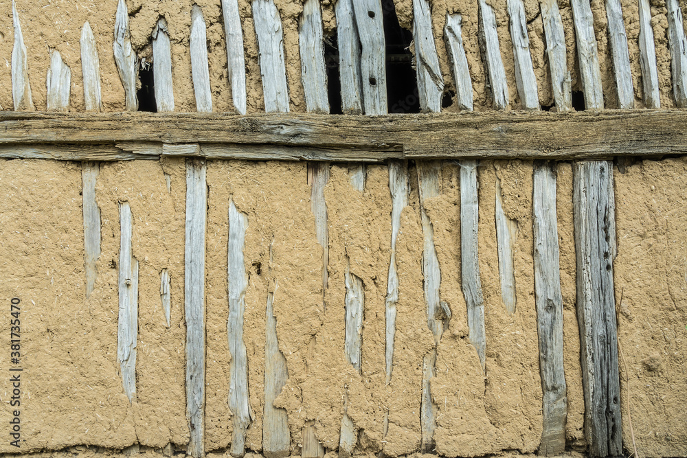 barn wall with wooden framework and clay barn wall with wooden framework and clay