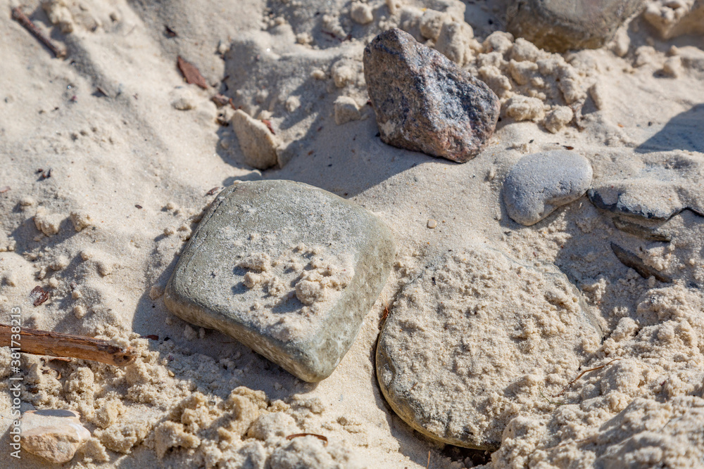 Untreated rough natural stone in everyday environment, gardening and landscaping Untreated rough natural stone in everyday environment, gardening and landscaping