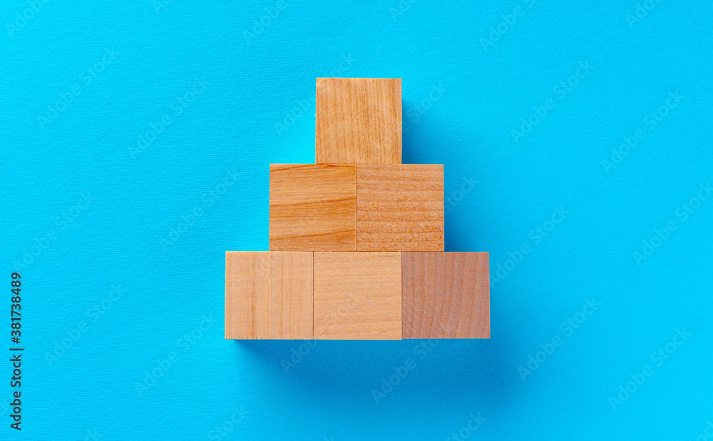 Top view of wooden toy blocks on blue Top view of wooden toy blocks on blue