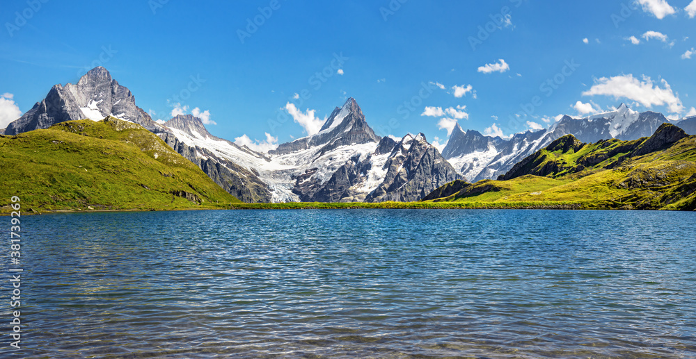 Bernese range above Bachalpsee lake. Peaks Eiger, Jungfrau, Faulhorn in famous location in Switzerland alps, Grindelwald valley