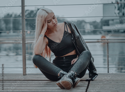 The blonde girl on the pier photo